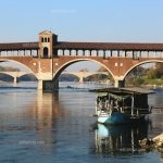 Pavia Covered Bridge was rebuilt in 1951 on the previous fourteenth-century model, under which flows the river Ticino. Lombardia Italy.